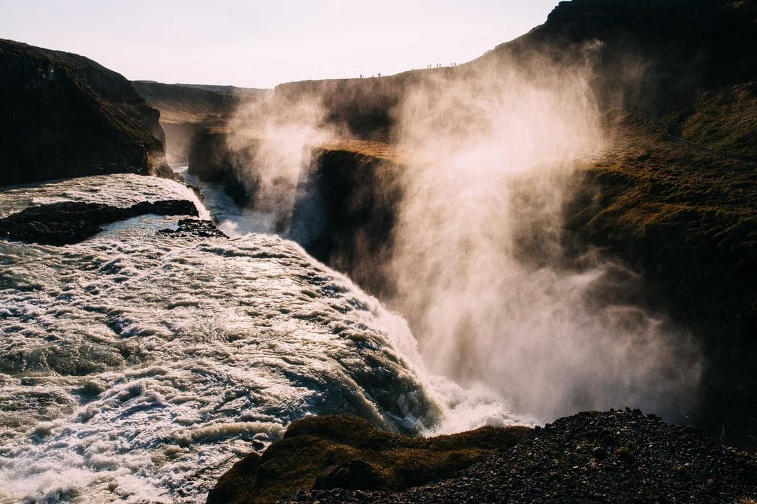 A physician assistant performing a check-up in a modern medical office.